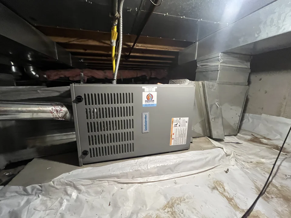 The replacement furnace in the same crawlspace