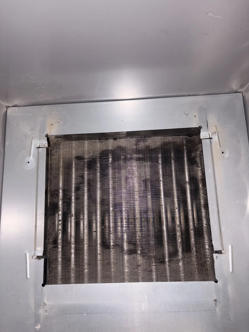The same indoor coil after cleaning