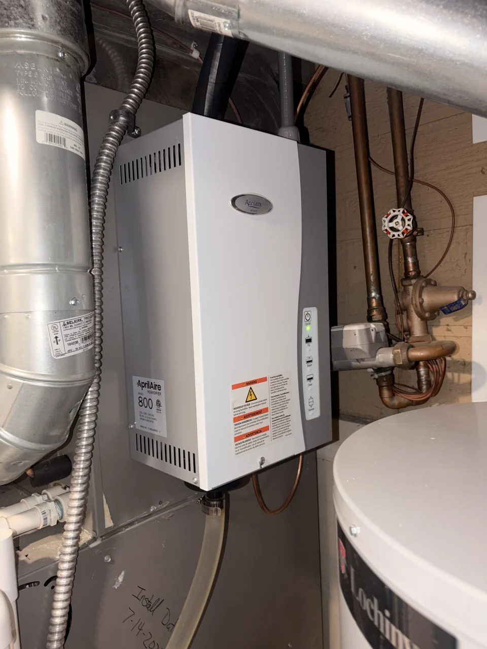 Steam humidifier connected to indoor HVAC equipment